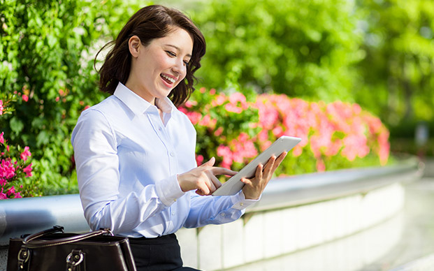 Happy girl on tablet